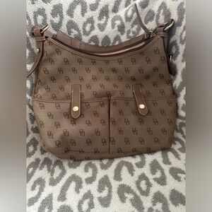 Dooney & Bourke brown large bag; good for travel.